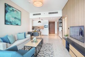 TV a/nebo společenská místnost v ubytování Millennium Executive Apartments Mont Rose