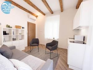 A kitchen or kitchenette at Basovizza 3 Chanel Tirabora Short Rent