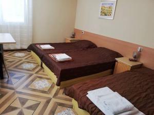 Postel nebo postele na pokoji v ubytování Guest House Dimi