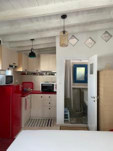 A kitchen or kitchenette at Seafront Villa Polyxene