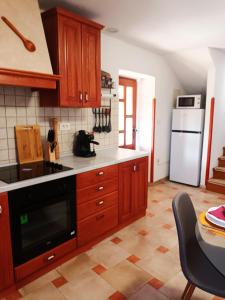 Kuchyň nebo kuchyňský kout v ubytování Guesthouse Marija