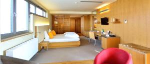 Ліжко або ліжка в номері Antonie Hotel****superior