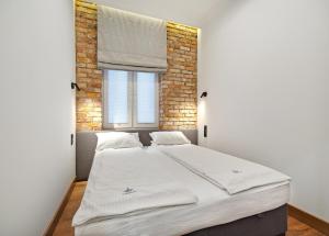 Posteľ alebo postele v izbe v ubytovaní Imperial Apartments - Cassino Royal