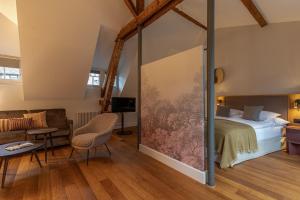 Postel nebo postele na pokoji v ubytování Romantik Seehotel Sonne
