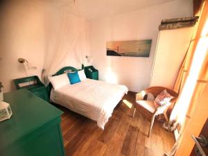 Postel nebo postele na pokoji v ubytování Casa Rural SUNSET
