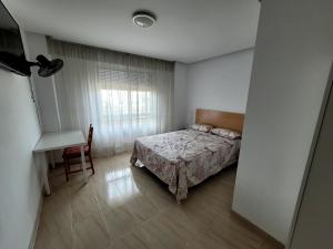 Postel nebo postele na pokoji v ubytování CA LAU