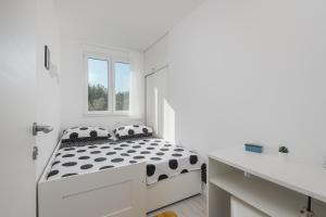 Ein Bett oder Betten in einem Zimmer der Unterkunft Apartment Dolce