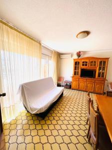 Llit o llits en una habitació de Apartamentos Centro Peñíscola