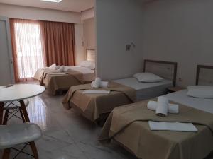 Ένα ή περισσότερα κρεβάτια σε δωμάτιο στο Sirena Apartments +30 φωτογραφίες