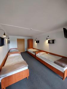 Postel nebo postele na pokoji v ubytování Diuna