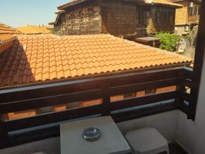 an overhead view of a tile roof on a building at Къщата с разкопките - The house with the excavations in Sozopol