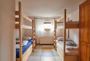 Krevet ili kreveti na sprat u jedinici u okviru objekta Villa Bademeusel