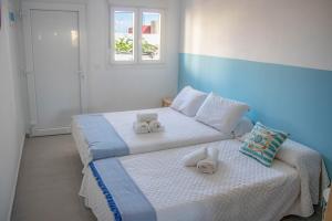 Postel nebo postele na pokoji v ubytování H El Palmeral Playa