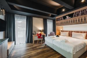 Szczawnica Park Resort & Spa客房内的一张或多张床位