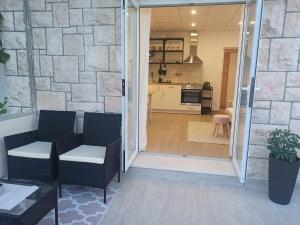 Kuchyň nebo kuchyňský kout v ubytování Apartman Vranac