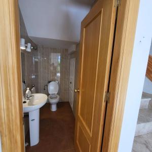 Kúpeľňa v ubytovaní Casa amplia adosada al lado de la playa