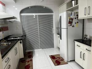Gallery image of Apartamento de 3 quartos amplos na praia Pitangueiras, Guaruja in Guarujá