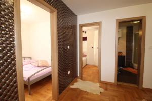 Posteľ alebo postele v izbe v ubytovaní Macadamia apartment with garage parking