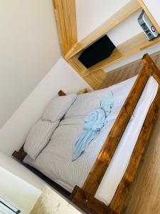 Postel nebo postele na pokoji v ubytování Apartamenty Łebska Ostoja