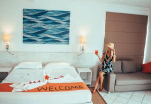 Astroea Beach Hotel客房内的一张或多张床位