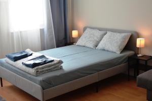 En eller flere senger på et rom på TIKE, TAK - Central Residence