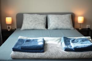 En eller flere senger på et rom på TIKE, TAK - Central Residence