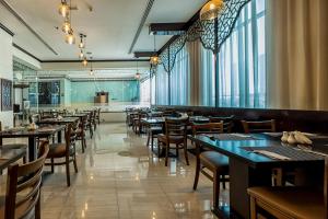 Restavracija oz. druge možnosti za prehrano v nastanitvi THE PARK HOTEL Formerly Al Jawhara Gardens