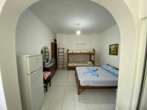 Postel nebo postele na pokoji v ubytování PineSide Rooms