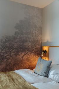 Postel nebo postele na pokoji v ubytování Romantik Seehotel Sonne