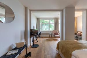 Postel nebo postele na pokoji v ubytování Romantik Seehotel Sonne