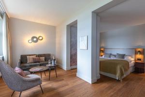 Postel nebo postele na pokoji v ubytování Romantik Seehotel Sonne