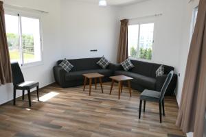 Χώρος καθιστικού στο Hôtel Corail de Cabo