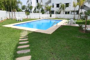 Πισίνα στο ή κοντά στο Hôtel Corail de Cabo