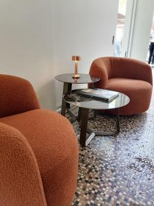 Uma área de estar em Hotel Messeyne