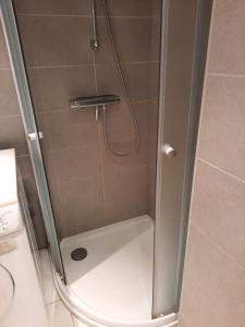 Ένα μπάνιο στο Appartement moderne de 94 m² 2 ch. sur la digue