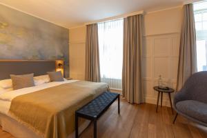 Postel nebo postele na pokoji v ubytování Romantik Seehotel Sonne
