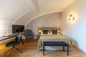 Postel nebo postele na pokoji v ubytování Romantik Seehotel Sonne