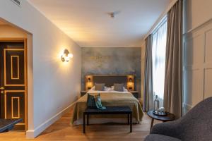 Postel nebo postele na pokoji v ubytování Romantik Seehotel Sonne