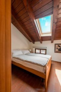 Katil atau katil-katil dalam bilik di Hotel Diffuso Locanda Elisa