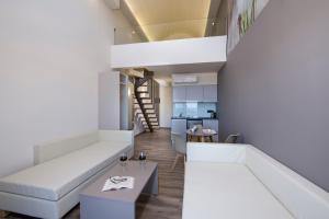 Postel nebo postele na pokoji v ubytování Incognito Creta Luxury Suites and More