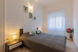 Postel nebo postele na pokoji v ubytování Apartment Porta di Pola