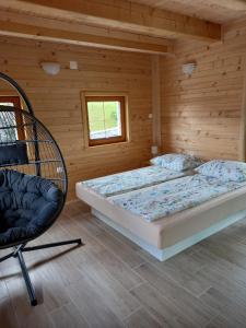 Postel nebo postele na pokoji v ubytování Tubej superior wellness house