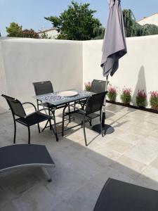 Uma varanda ou terraço em Locations Ile de Ré