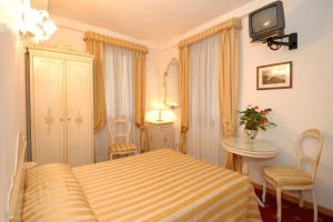 Ένα ή περισσότερα κρεβάτια σε δωμάτιο στο Casa Sul Molo