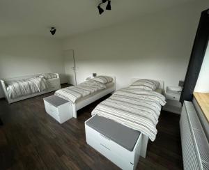 Ένα ή περισσότερα κρεβάτια σε δωμάτιο στο Helle, große Unterkunft in ländlicher Umgebung
