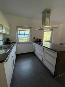 Kuchyň nebo kuchyňský kout v ubytování Ferienwohnung Erika