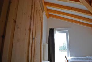 Posteľ alebo postele v izbe v ubytovaní Hotel Elbele Garnì