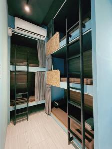 a room with bunk beds in a house at Good hostel 好棧 Green Island in Green Island