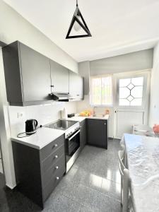 Kuchyň nebo kuchyňský kout v ubytování Atrium Apartment #1