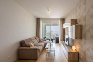 A seating area at Luxury Apartment "Ema" with sea view & parking